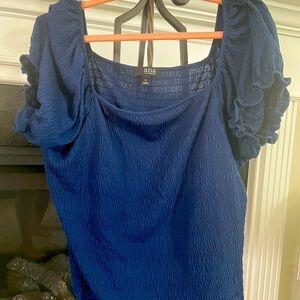 Navy blue shirt with puffy sleeves